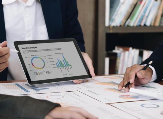business-team-analyzing-income-charts-and-graphs-with-modern-laptop-computer-close-up-business-analysis-and-strategy-concept-photo