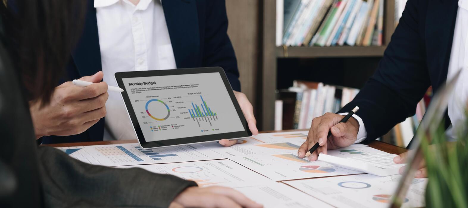 business-team-analyzing-income-charts-and-graphs-with-modern-laptop-computer-close-up-business-analysis-and-strategy-concept-photo